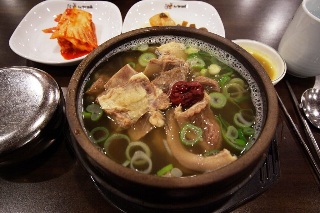 A bowl of Korean galbitang, a clear beef short rib soup.